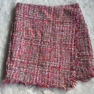 Accented and textured pink mini skirt with